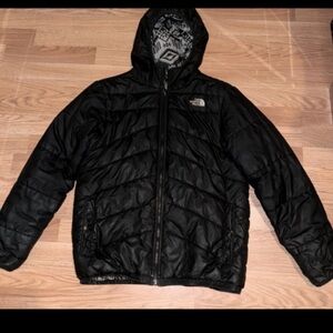 The North Face kids size XL black puffer coat worn still lots of life left
